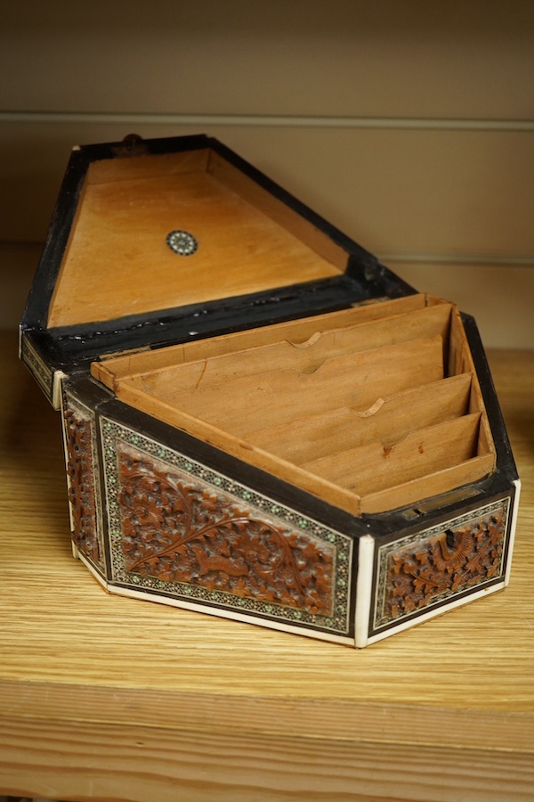 An Anglo-Indian Vizagapatam sandalwood and bone stationery box of tapered form, 23cm wide. Condition - good, base cracked